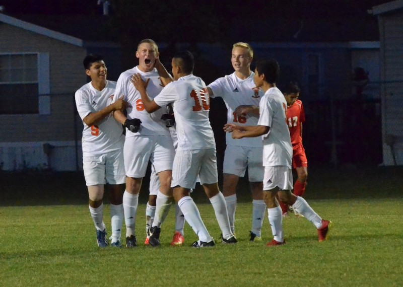 Sam Allbritten (6) celebrates after making a goal to tie things up in the first half. (Photos by Nick Goralczyk)