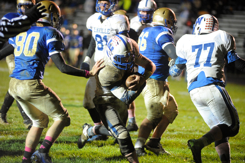 LaVille running back Ben Norton smashes through the Triton defense for a touchdown in the third quarter of LaVille's 15-0 win Friday night. (Photos by Mike Deak)