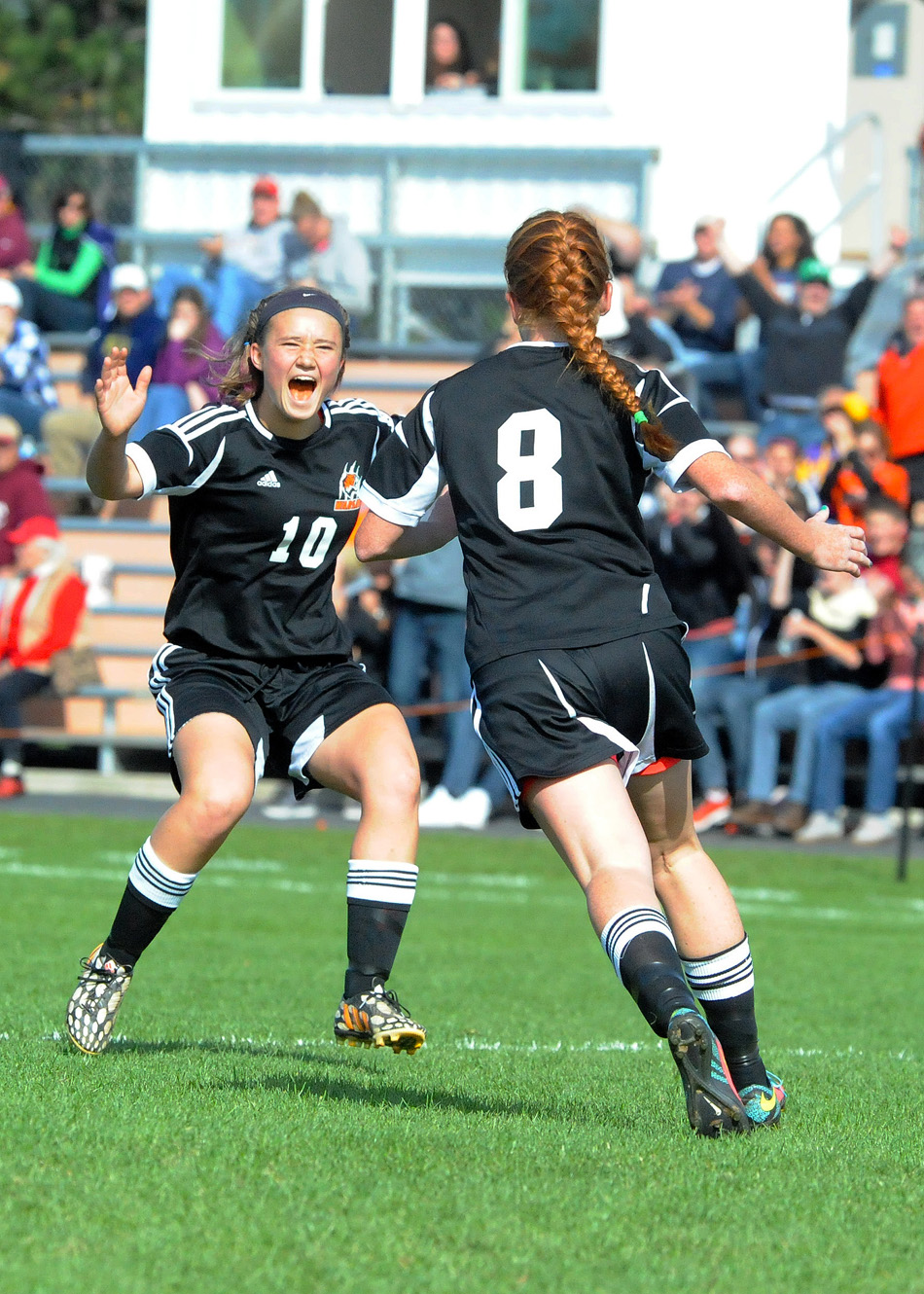 Warsaw's dynamic duo of Elizabeth Van Wormer (10) and Brooklyn Jackson have done a lot of celebrating this postseason.