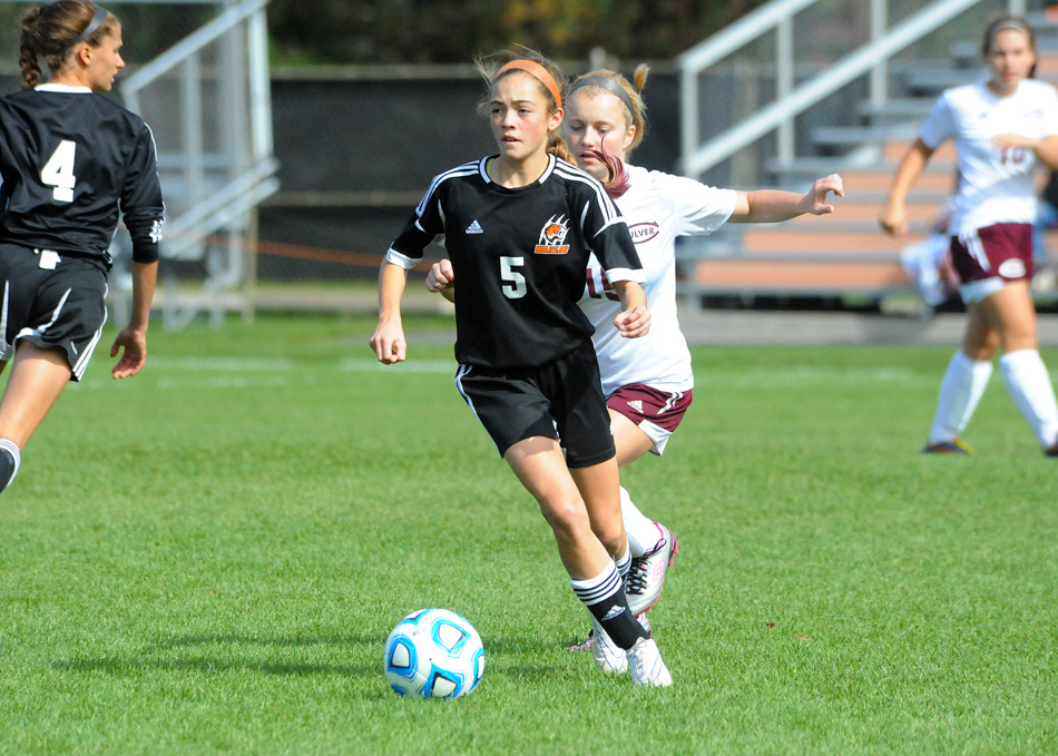 Warsaw freshman Brenna Shipley has given the Lady Tigers surprising stability at midfield. (Photos by Mike Deak)