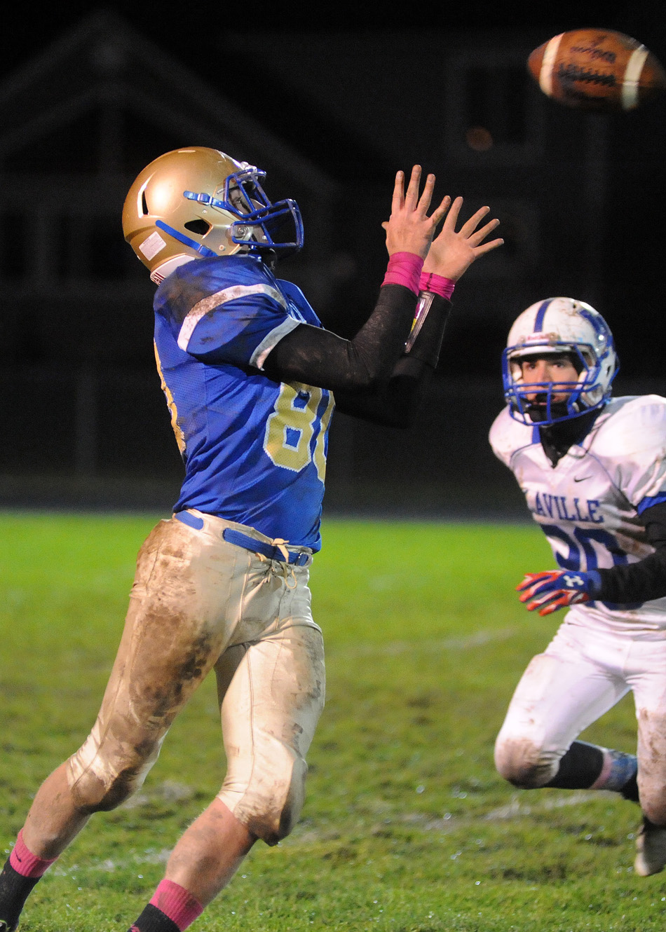Triton wide receiver Tristan Hunsberger hauls in a catch, one of just four completions by either team all night.