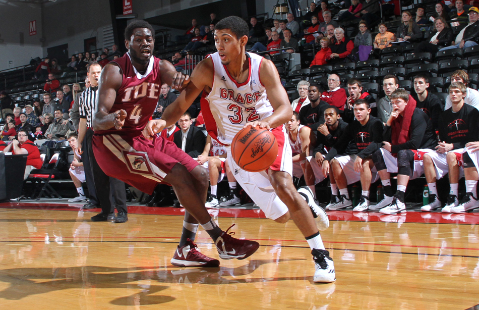 Grace College's Brandon Vanderhegghen drives against Indiana-East Saturday night in the Terry Polston Tourney. (Photo provided by the Grace College Sports Information Department)