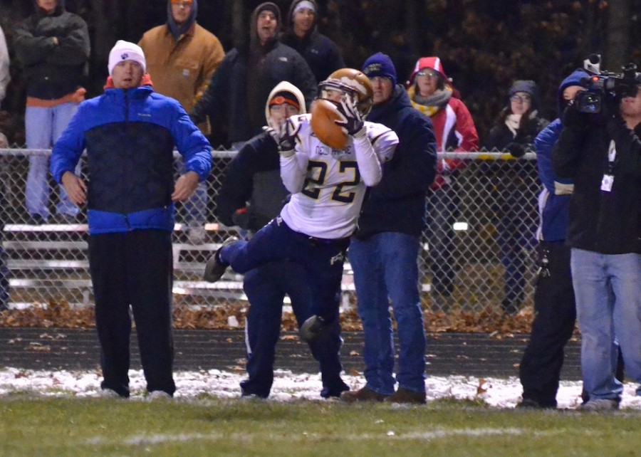 Drake Dierdorf makes a spectacular diving grab for the Cougars during the fourth quarter of Friday's semi-state championship game. (Photos by Nick Goralczyk)