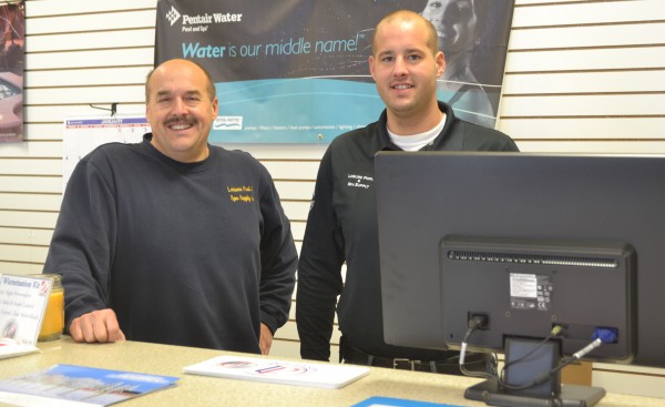 Leisure Pool & Spa Supply owner Tim Yoder, left, and his son, Mark, are excited about the growth their business has experienced in its 25 years. Yoder stated, “We’ve been very blessed.”