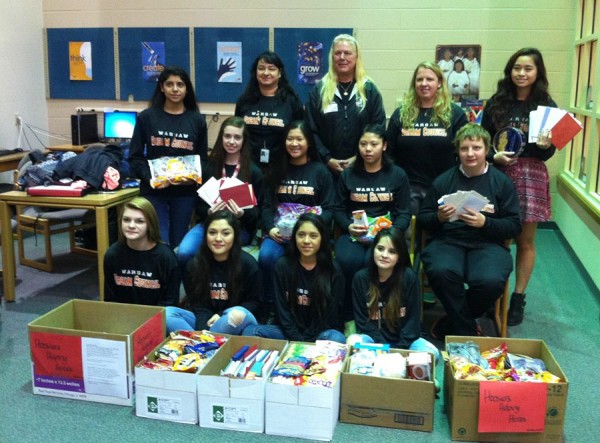 The Dream Council at Warsaw Community High School with collected snacks and drinks to be sent to troops.