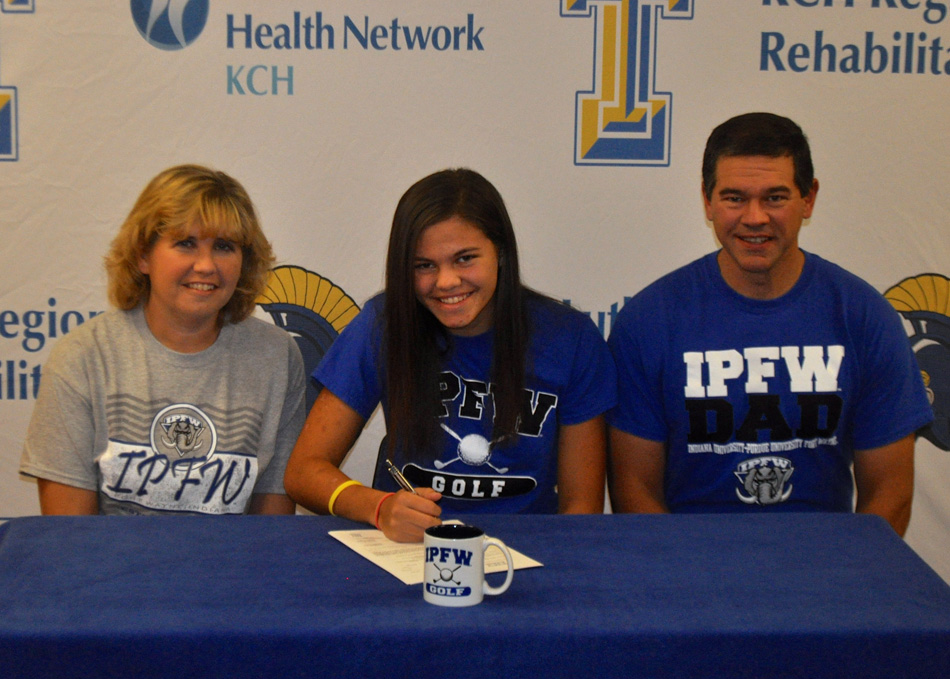 Triton High School senior Hannah Jennings has signed a national letter of intent to continue her golf career at IPFW. Seated with Jennings are parents Staci and Scott Jennings. (Photo provided by the THS athletic department)