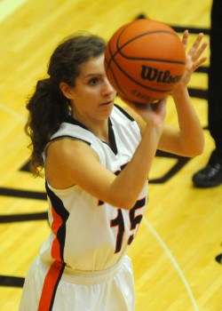 Vicki Harris of Warsaw lines up one of her made threes against Tippecanoe Valley.