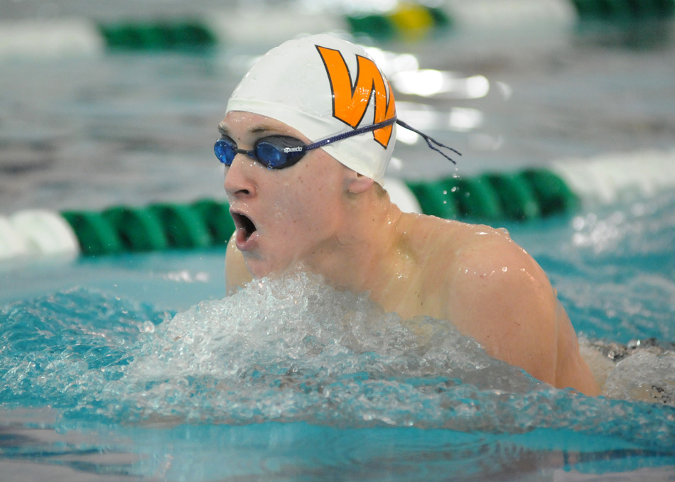 Matt Wildman of Warsaw swims the medley relay against Wawasee Saturday morning. (Photos by Mike Deak)