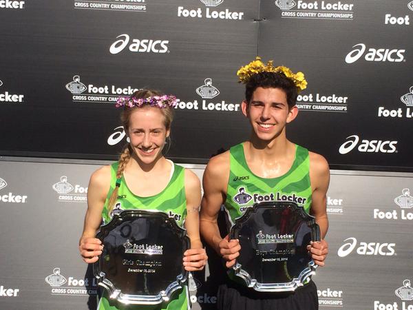 Anna Rohrer of Mishawaka is shown Saturday after winning the Foot Locker Cross County National Championship in San Diego. At right is boys' champion Grant Fisher. 