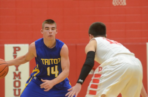 Triton's Jordan Anderson looks for room versus Plymouth Tuesday night. The host Pilgrims posted a 51-45 win.
