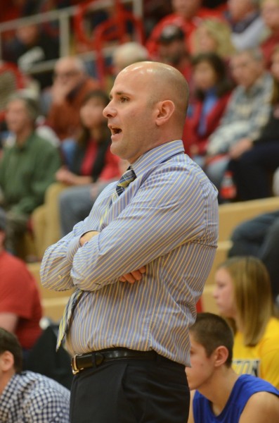 Triton coach Jason Groves gives instructions to his team at Plymouth Tuesday night.