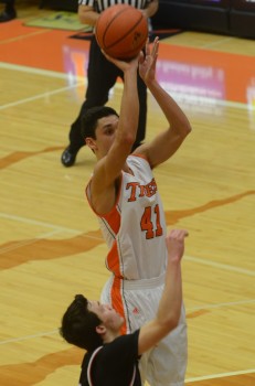 Riley Rhoades goes up in the lane for the Tigers (Photo by Scott Davidson)