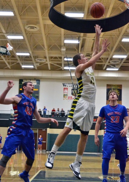 Aaron Voirol gets his first basket of the night for Wawasee.