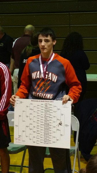 Warsaw sophomore Kyle Hatch claimed the championship at 120 pounds at the Al Smith Invitational Wednesday. Hatch is 22-0 this season (Photos provided)