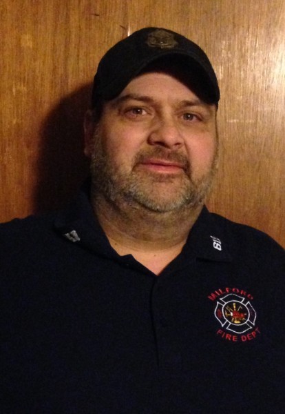 Lee Price recently retired after 27 years as a volunteer firefighter with the Milford Fire Department.