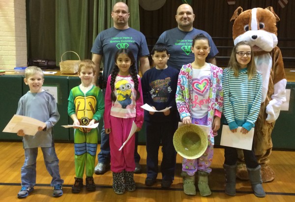 Mentone Elementary Students honored in December are: Grayson Waldo, Harvey Hayes, Camila Aguilar, Jorge DeLaRose, Corina Stiles, and Sydney Petersen. In back are Mentone Police Officers Terry Engstrand and Jim Eades, and The Mentone Bulldog. (Photo provided) 