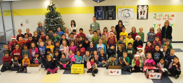 Jefferson Elementary second graders and teachers with their donated items.