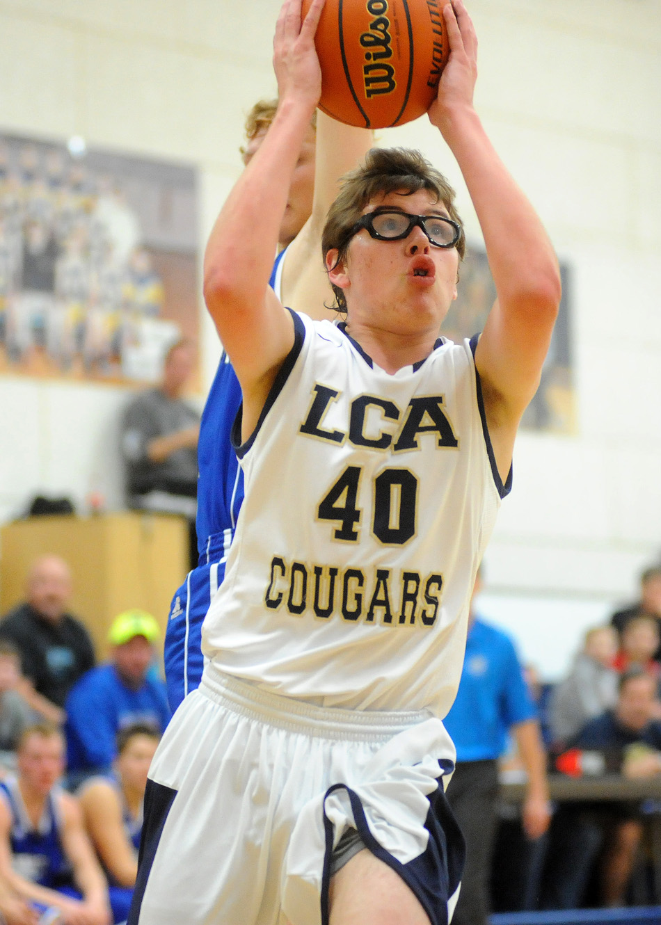 Conner Blum of LCA drives for a shot attempt against Hamilton.