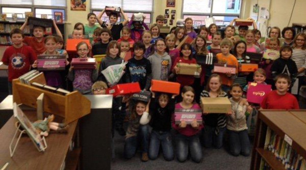 Pierceton Elementary fourth graders with their shoe boxes for Operation Christmas Child. 