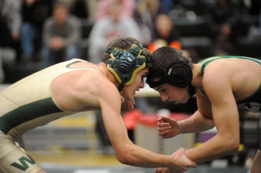 Wawasee's Ricardo Romo and Concord's Kevin Sibel lock horns.