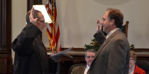 Incoming Kosciusko Sheriff Aaron Rovenstine, right, being sworn in.