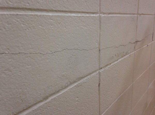 Edgewood's gym wall shows signs of high pressure.