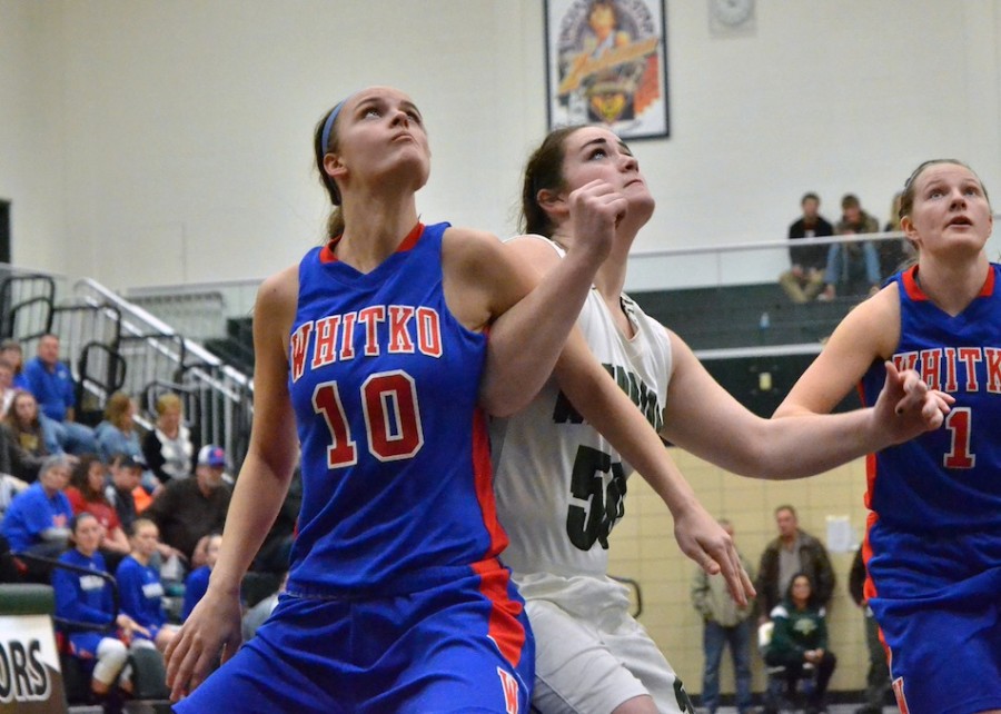 Avaree Freel (left) and Katlyn Kennedy (right) battle for a rebound in the fourth quarter of Tuesday's game. (Photos by Nick Goralczyk)