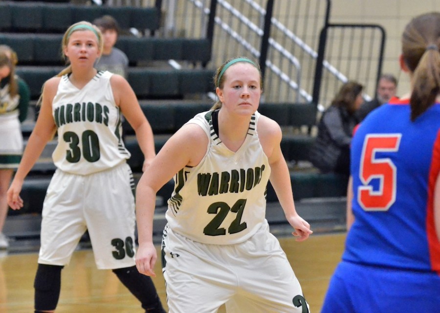 Hannah Haines eyes the ball while playing defense for Wawasee.