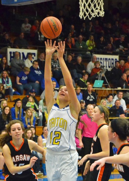 Hannah Jennings goes up for two against Warsaw during Friday's win. (Photos by Nick Gorlaczyk)