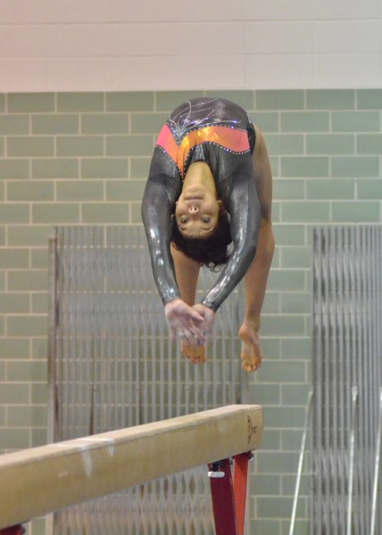 Warsaw's Jazzmine Brown performs her beam routine at Wawasee Tuesday night. (Photos by Nick Goralczyk)