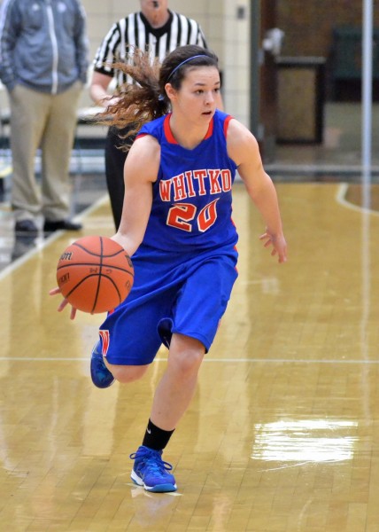 Riley Insley brings the ball up for the Wildcats during the junior varsity contest. 