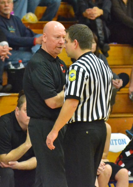 Bobcats head coach Terry Minix had a word with an official after one his starters fouled out.