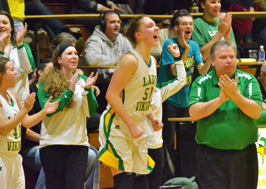 Anne Secrest (center) and the Valley bench celebrate as the final seconds tick off the clock in Saturday's win.