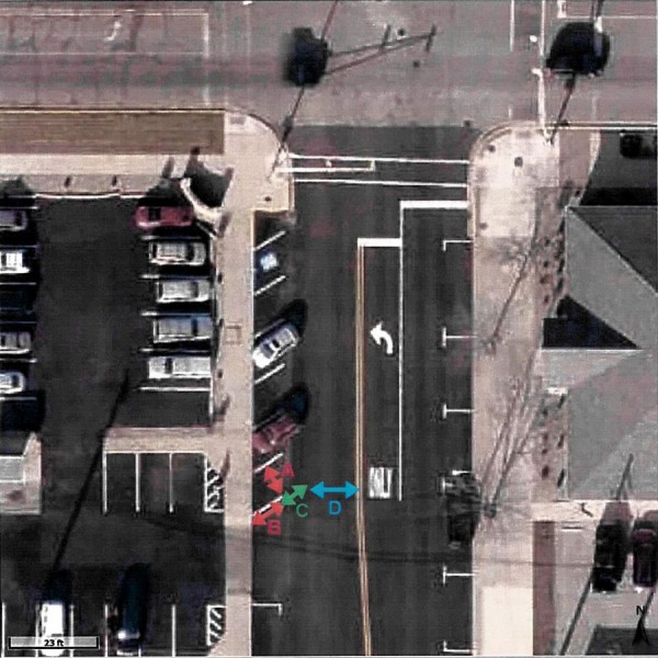 This map shows the angle parking along Lake Street, south of Market Street. The width of these spaces are 10 feet and the length is 10 feet. Legal parking spaces must be 18 feet by 10 feet or 20 feet by 9 feet. The southern most parking space will be eliminated and the line lengthened to the legal requirements.