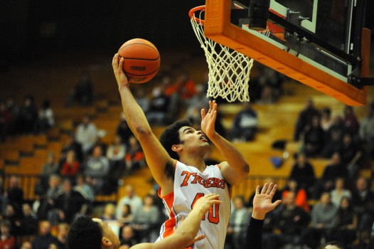 Warsaw's Rashaan Jackson flies in for a reverse layup against LaPorte Saturday night. (Photos by Mike Deak)