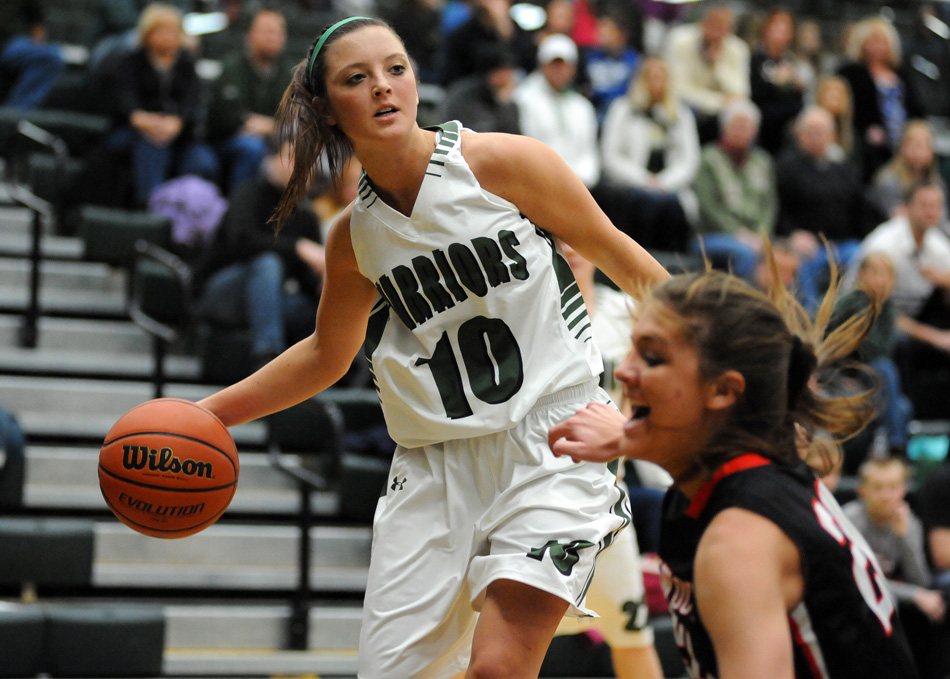 Wawasee's Elizabeth Jackson is called for an offensive foul, drawn by NorthWood's Jordyn Frantz Saturday in NorthWood's 63-34 victory at Wawasee. (Photos by Mike Deak)