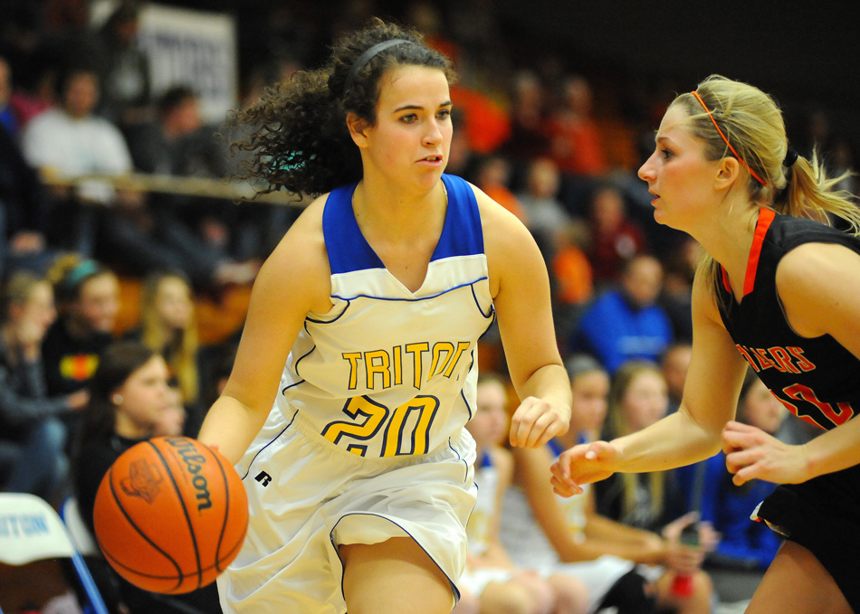 Triton's Becca Kennedy drives on Culver's Tatum Schultz.