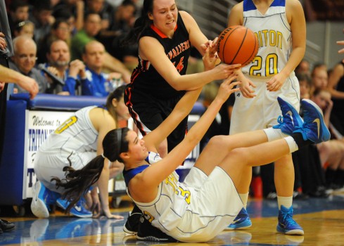 Triton's Jaela Meister and Culver's Marisa Howard fight for a loose ball Friday night. (Photos by Mike Deak)