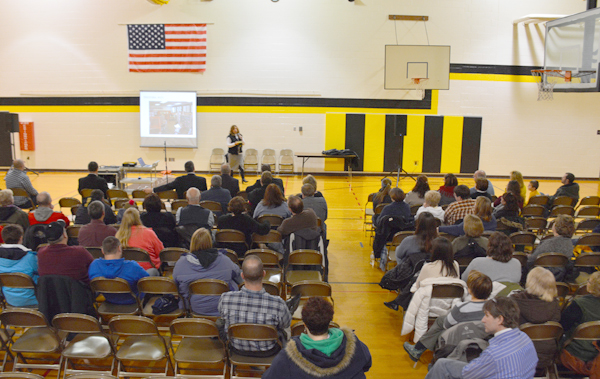 Akron Elementary Principal Chrissy Mills addresses the crowd. (Photo by Jarrett Van Meter)