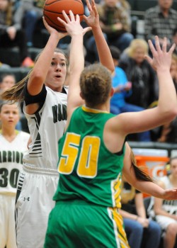 Wawasee's Aubrey Schmeltz shoots over Valley's Anne Secrest.