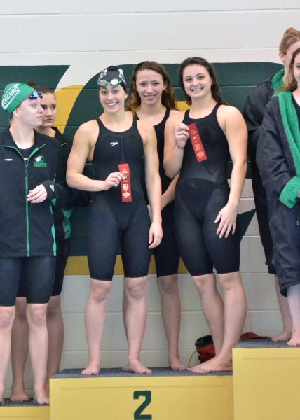 New school record holders and state qualifiers in the 200 medley relay: Bre Robinson Kendra Miller and Mikala Mawhorter. Shelby Adams is not pictured. (Photos by Nick Goralczyk)