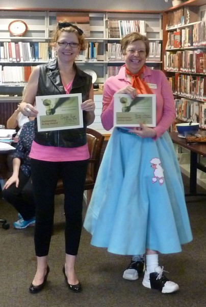 Missy Sorg and Janette Stackhouse were recognized for the best costumes at the library’s “Murder on the Dance Floor” 1950’s mystery dinner.