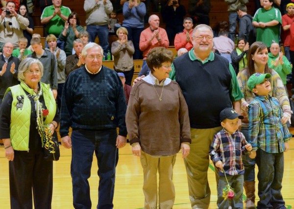 Buddy Busby (second from left) and Roger Moriarty (fourth from left) enjoy a moment of appreciation from Valley fans during a ceremony in their honor at Friday's game. (Photo provided)