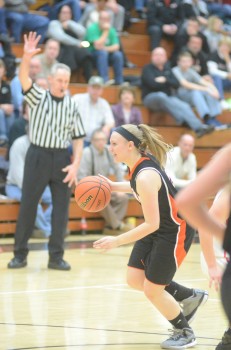 Jodie Carlson heads to the hoop for the Tigers.