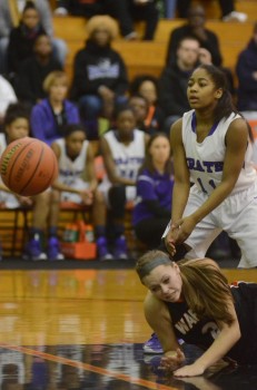 Madi Graham hits the deck as the ball goes flying out of bounds.