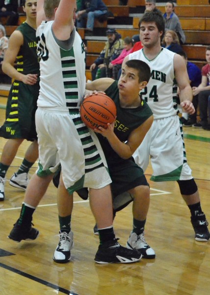 David Rocha tries for a contested basket.