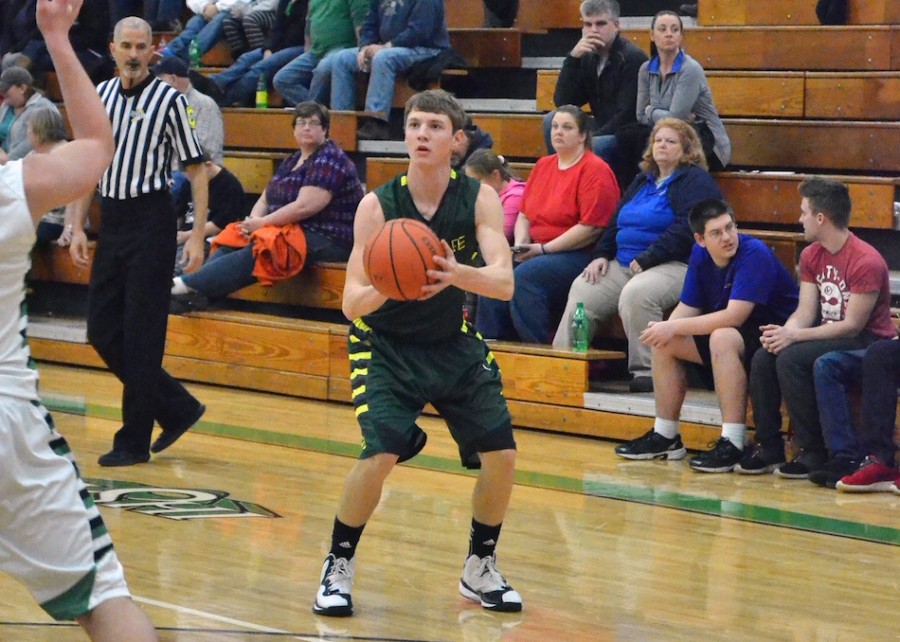 Wide-open shots like this helped Gage Reinhard (pictured) and Wawasee score a season-high 74 points in Tuesday's win over Bremen. (Photos by Nick Goralczyk)