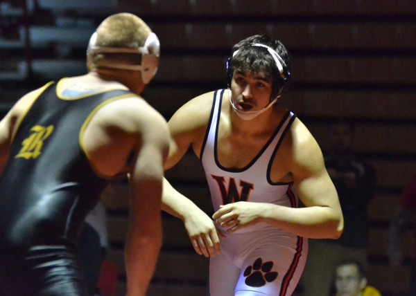 Rory Nolin feels out his opponent in the 195-pound sectional championship Saturday afternoon at Plymouth High School. (Photo by Nick Goralczyk)