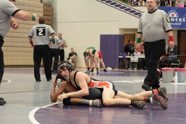 Warsaw sophomore Kyle Hatch controls his opponent Saturday at the Merrillville Semistate. Hatch earned his second straight trip to the State Finals with a third-place finish (Photos provided by Scott Gareiss)