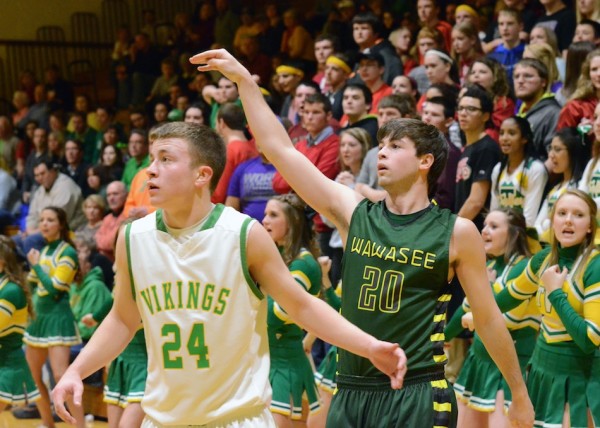 Wawasee's Jake Hutchinson takes a shot over Valley's Alec Craig during Friday's game. (Photo provided)